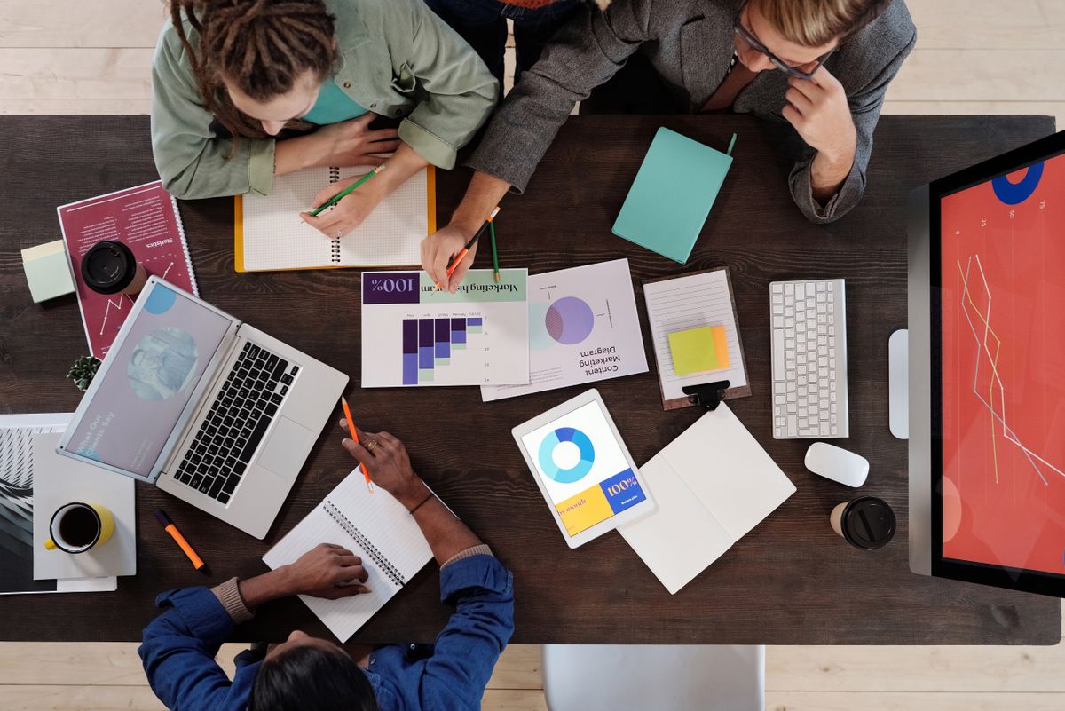 Business owner evaluating team costs
